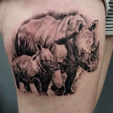 Realistic rhinos. Tattooed by @jolenetat at @divinearttattoo Poole ...