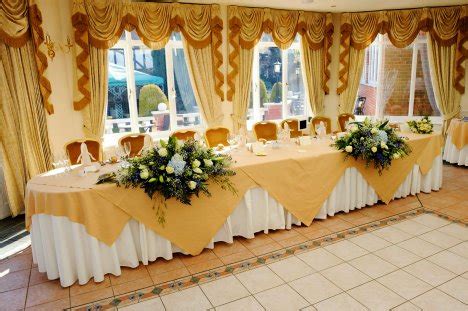 Table Skirting Designs - Ideas for Decorating a Reception Bride Table