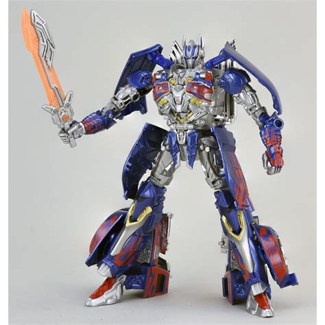 Buy Transformers TLK - 15 CALIBUR Optimus Prime Limited Edition Online at desertcart INDIA