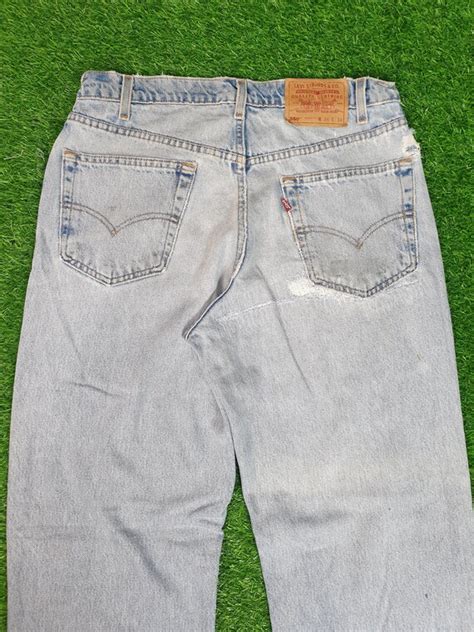 Vintage LEVIS 550 Light Wash Sun Faded Levis 550 Rel… - Gem