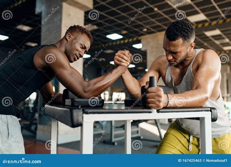 Two Men Fighting, Arm Wrestling Training in Gym Stock Image - Image of athletic, indoor: 167425463