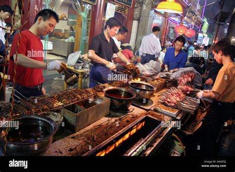 Night food market in the Muslim Quarter in Xi an China Stock Photo - Alamy