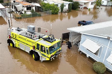 A canoe, a rope and a swimmer: Rescuing Californians stranded by recent ...