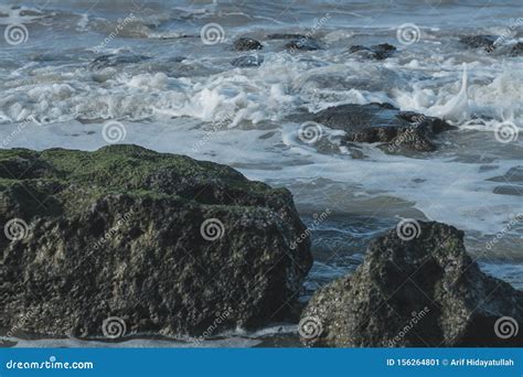 The Small Waves on the Beach Stock Image - Image of land, crop: 156264801