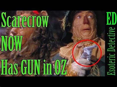 Scarecrow with gun in wizard of oz - parkgilit