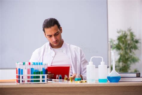 Young Male Chemistry Teacher in the Classroom Stock Image - Image of ...