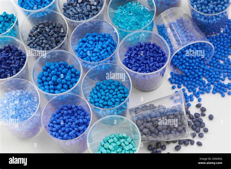 different blue plastic resin granulates for injection moulding process in different granulate ...