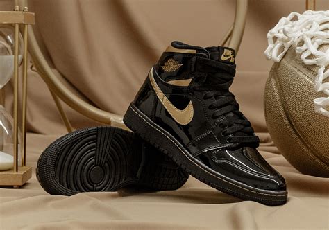 Air Jordan 1 Black Gold Patent Leather 555088-032 | SneakerNews.com