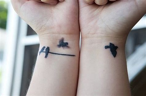 elegant bird tattoo birds on wire