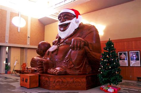 Japan's Laughing Buddha Hotei is merging into Santa Claus -- both are roly-poly sacred figures ...