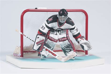 Dominik Hašek / Buffalo Sabres Goalie Dominik Hasek Pulls The Puck From ...