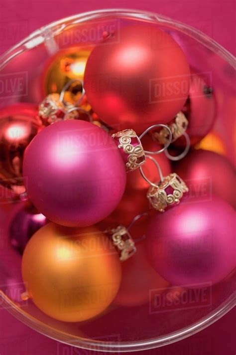 Red Christmas tree baubles - Stock Photo - Dissolve