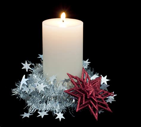 Photo of burning festive candle | Free christmas images