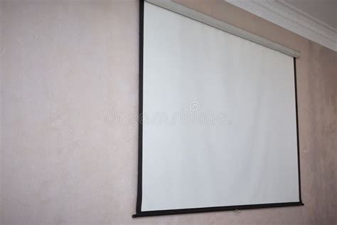 Large Wall Projector Screen on the Wall. Stock Image - Image of ...