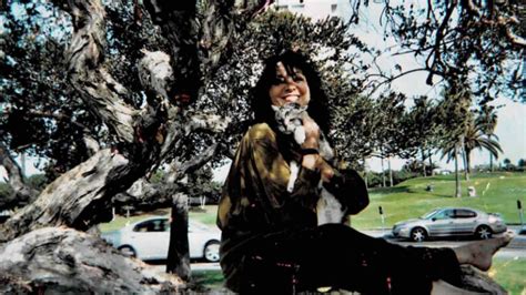 Suzanne Verdal, the one the song is about, pictured holding a kitty! : r/leonardcohen