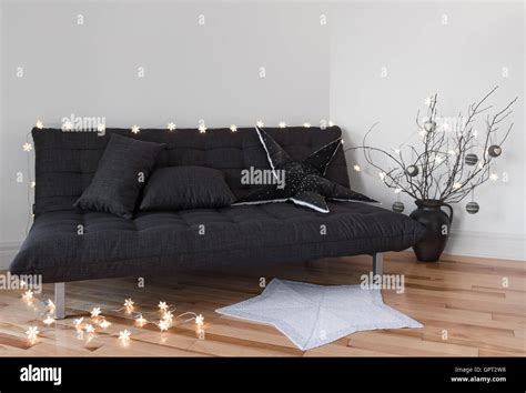 Cozy lights decorating the living room Stock Photo - Alamy