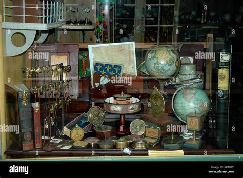 Antique store window display selling antique astronomical instruments ...