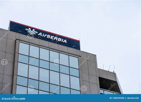 Logo of Air Serbia, on Their Main Office at Dusk. Air Serbia, Partly Belonging To Etihad, is ...