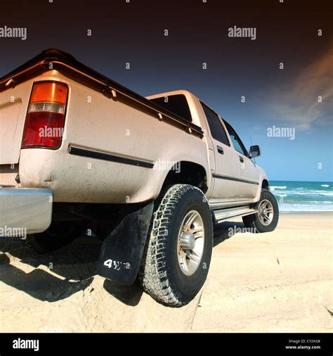 car on beach Stock Photo - Alamy