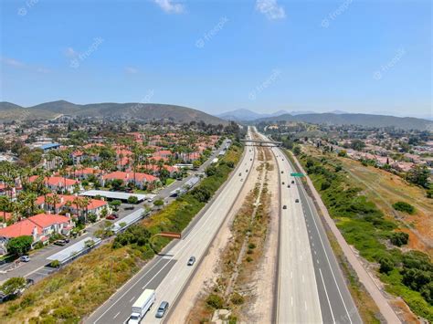 Premium Photo | Aerial view of highway, freeway road with vehicle in ...