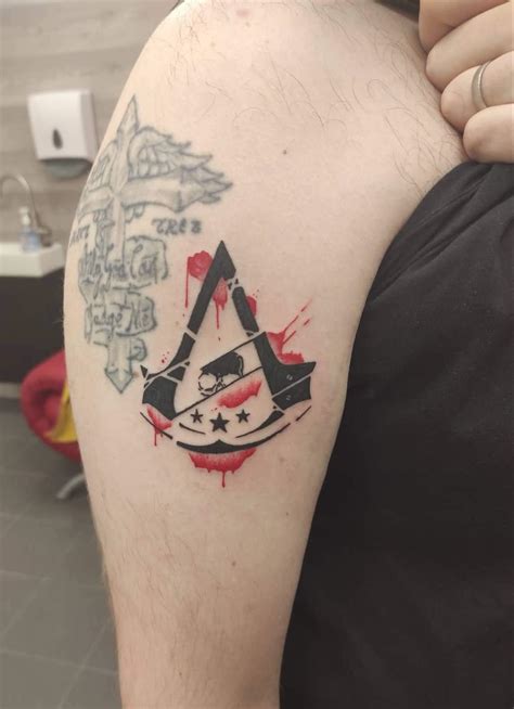 Top 78+ assassin's creed symbol tattoo best - in.cdgdbentre