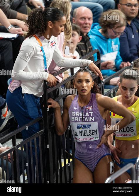 Laviai Nielsen of Great Britain talking to her twin sister Lina Nielsen ...