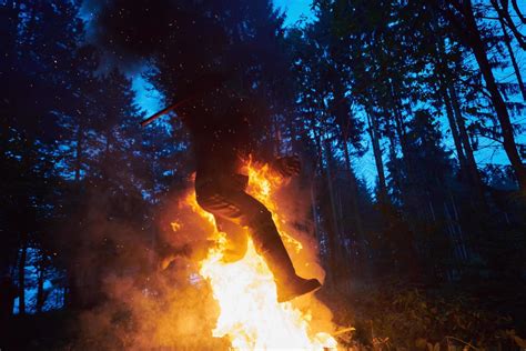 Soldier in Action at Night jumping over fire 11634202 Stock Photo at Vecteezy