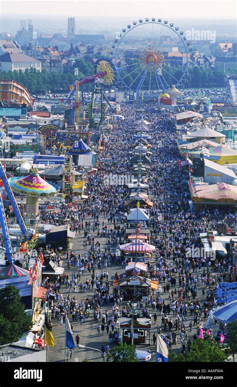 The Oktoberfest rides and crowds in Munich Stock Photo - Alamy