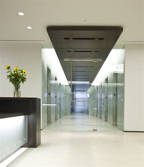 Modern Elevator Lobby Design with Dark Ceiling and Black Lobby Island Decoration Idea | LIFT ...