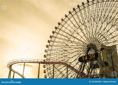 Minato Mirai of the Ferris Wheel and Cosmo Clock Sunset Stock Photo ...