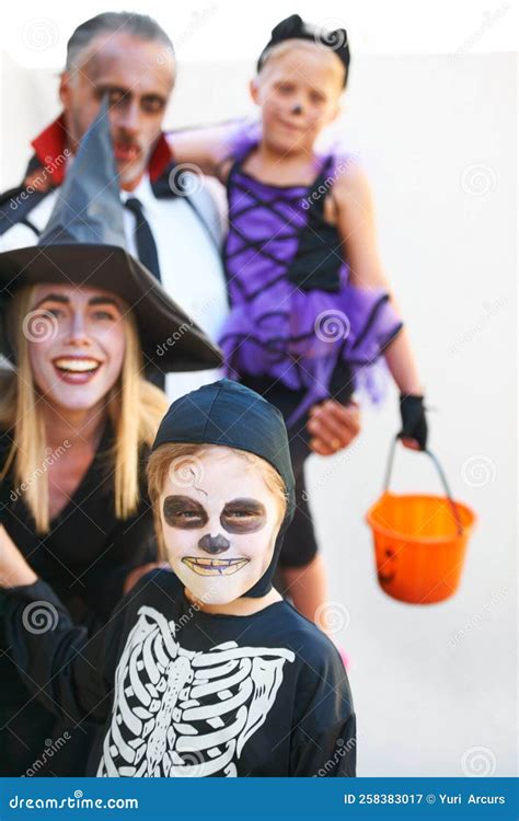 Surprise. a Cute Family Dressed Up for Halloween Looking Scary. Stock ...