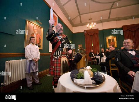 Addressing the haggis at a traditional Burns Night Supper Stock Photo ...