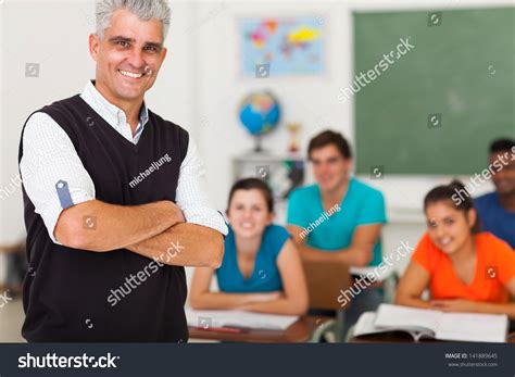 Smiling Middle Aged High School Teacher Stock Photo 141889645 | Shutterstock