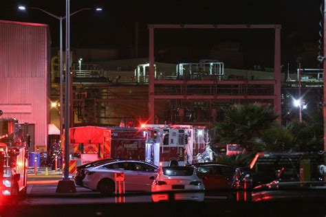 Crews extinguish fire outside Tesla factory in Fremont