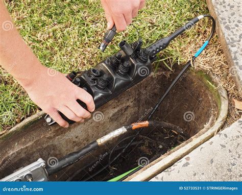 Installation of a Customer Connection Drop Cable into a Multiport Editorial Photo - Image of ...