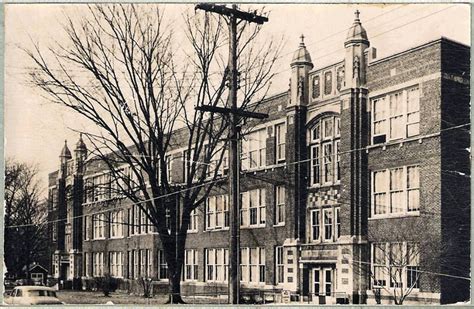 an old black and white photo of a building