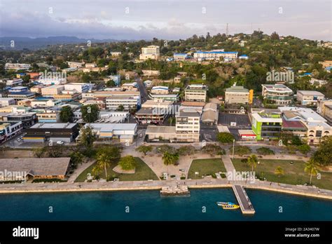 Aerial view of Port Vila city center with the waterfront promenade and the seawall public park ...