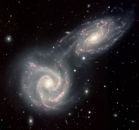 APOD: 2013 August 25 - The Colliding Spiral Galaxies of Arp 271