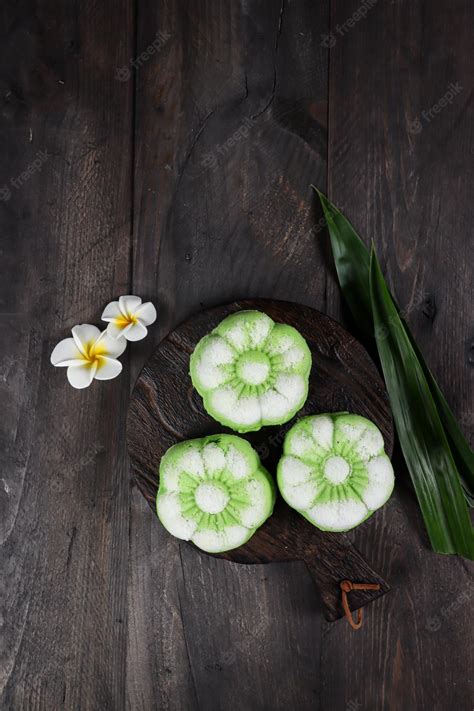 Premium Photo | Kue putu ayu is an indonesian traditional steamed snack topping with grated coconut