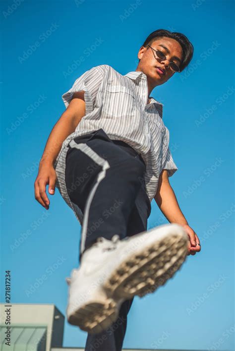 low angle photography of person wearing black sunglasses Stock Photo | Adobe Stock