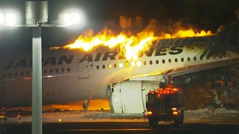 Japan plane fire latest: Hundreds survive plane collision inferno ...