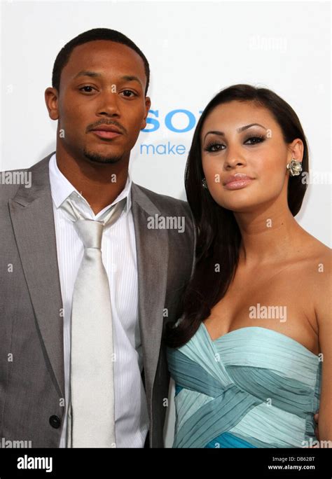 Romeo Miller, Francia Raisa Los Angeles Premiere of 'Jumping The Broom' held at ArcLight Cinemas ...