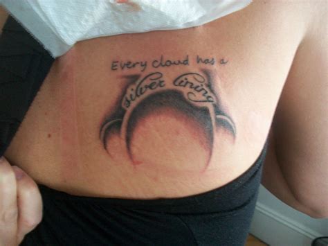 Every cloud has a silver lining tattoo design