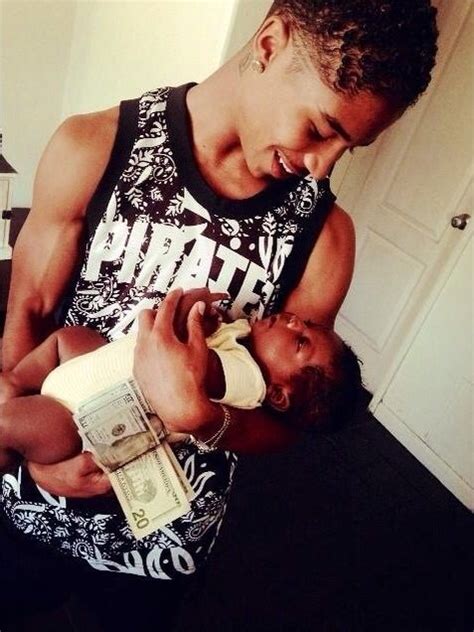 Roc Royal of Mindless Behavior with his baby, Royal.