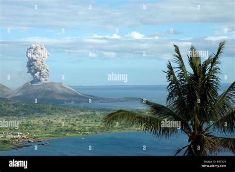 Looking over Rabaul at the erupting volcano Tavurvur Rabaul Caldera New Britain Island Papua New ...