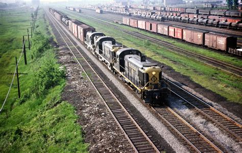 transpress nz: Erie Lackawanna railroad Alco RS3 trio on a freight train, early 1960s