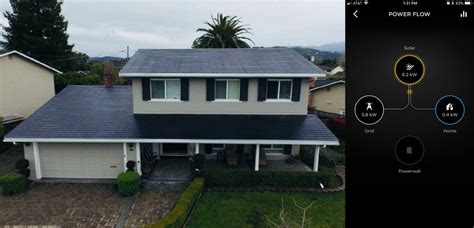 First Tesla solar roof customer installation is now up and running - feeding the grid and ...