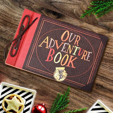 an adventure book surrounded by christmas decorations on a wooden table with pine cones and ...