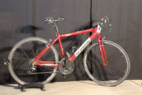 RED SCHWINN CIRCUIT XST 21 SPEED ROAD BIKE - Able Auctions