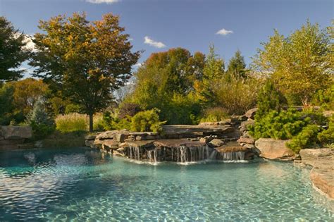 Waterfalls | Pool waterfall, Backyard pool landscaping, Natural ...